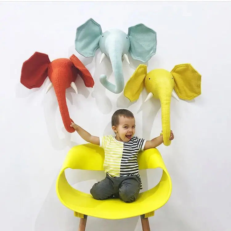 Cabeça de Elefante Amarelo em tecido, estilo nórdico. Decoração segura e charmosa para quarto infantil, fácil de pendurar e perfeita para criar um ambiente acolhedor e divertido