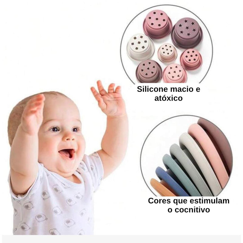 Torre de Silicone Montessoriana: brinquedo educativo composto por 7 peças coloridas, ideal para desenvolver habilidades cognitivas e motoras, feito de silicone hipoalergênico e livre de BPA. Perfeito para decoração de quartos infantis