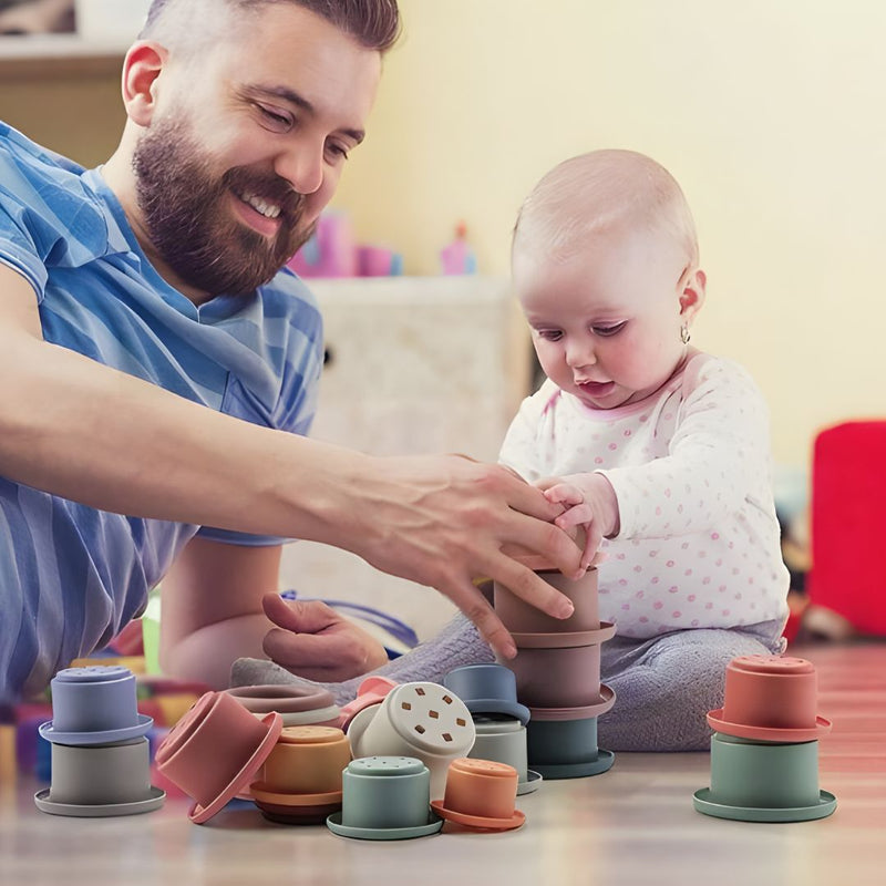 Torre de Silicone Montessoriana: brinquedo educativo composto por 7 peças coloridas, ideal para desenvolver habilidades cognitivas e motoras, feito de silicone hipoalergênico e livre de BPA. Perfeito para decoração de quartos infantis